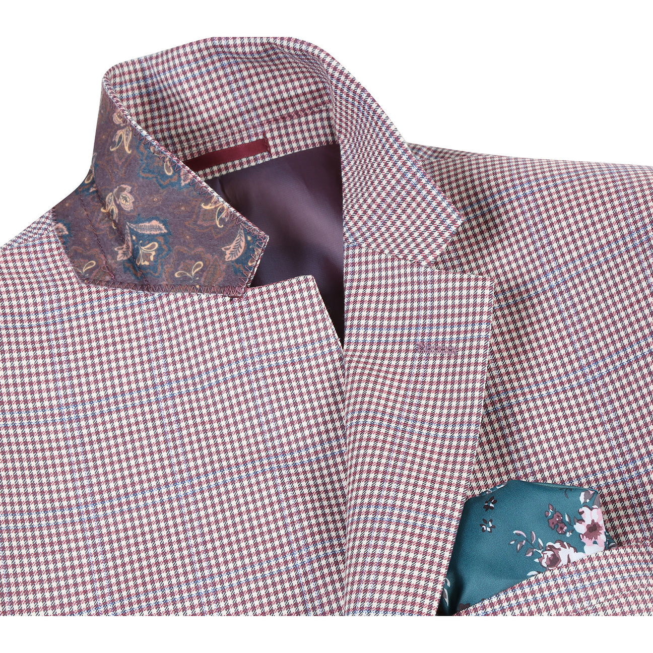 A mannequin displays the Alessandro Vitello by Renoir Slim Fit Wool Blazer in pink, crafted from 100% wool. It's styled with a white shirt, patterned black tie, and highlighted by a teal pocket square.