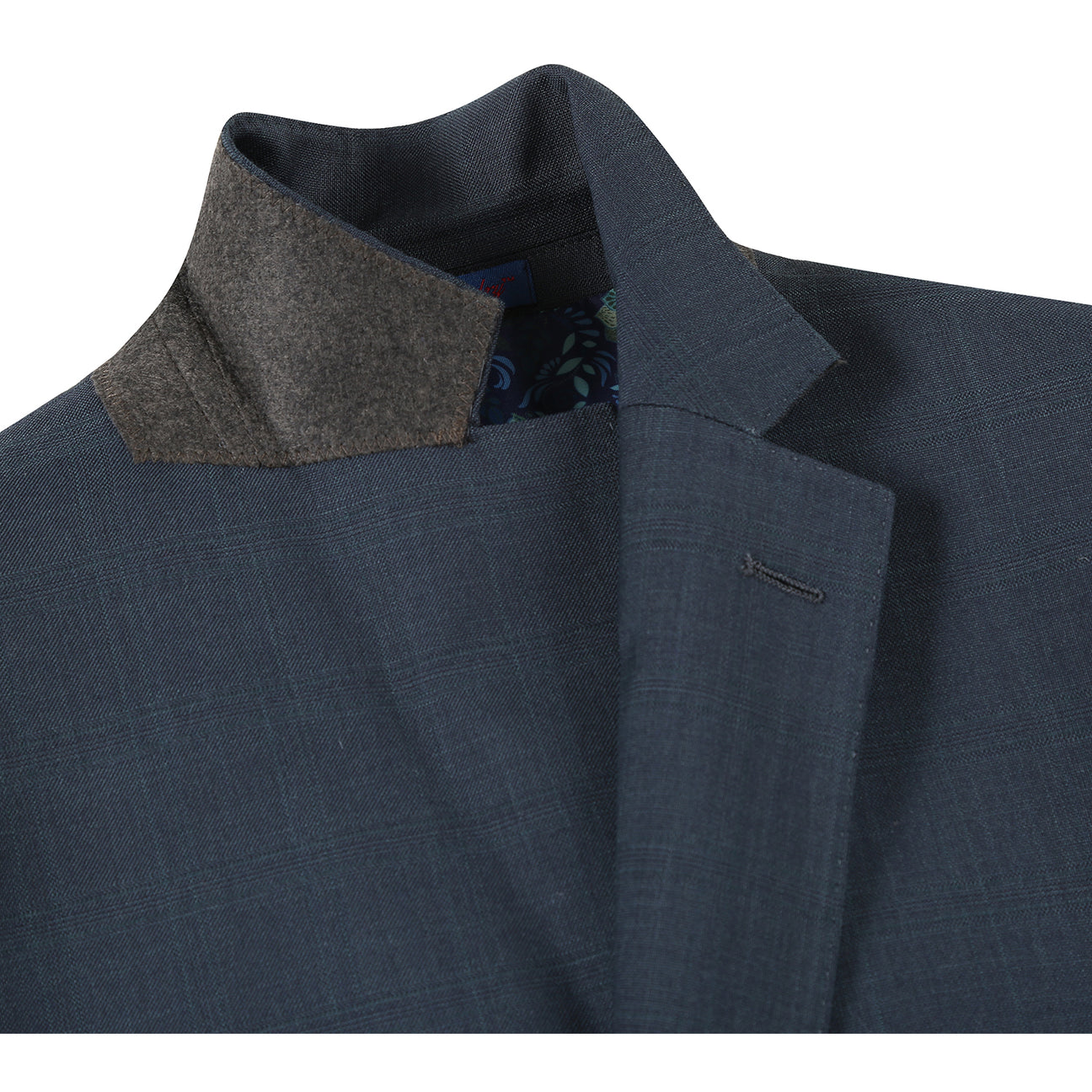 The English Laundry ENGLISH LAUNDRY Dark Green Check Suit 22-52-341EL features a men's suit jacket in dark green check with notch lapels and a two-button closure, styled over a white dress shirt and black striped tie on a mannequin.