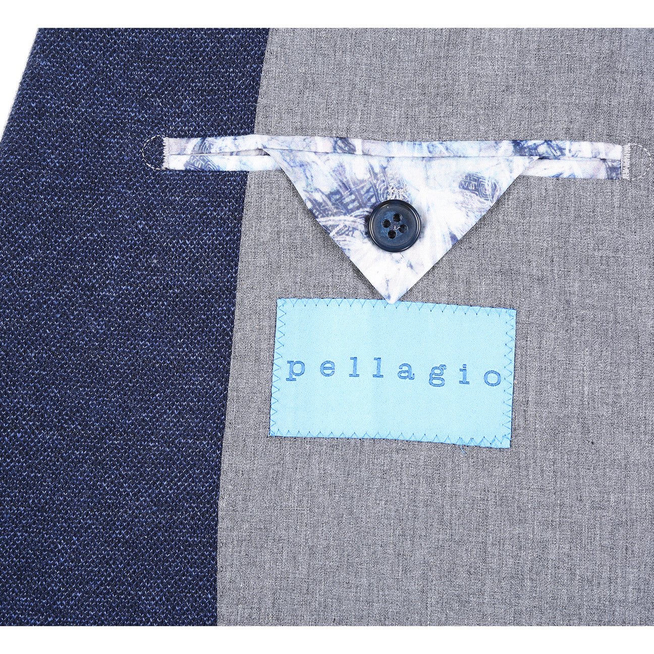 The Pellagio Men's Slim Fit Riserva Jacket Navy PF25-9 is styled over a white dress shirt with a striped orange and blue tie and patterned pocket square, displayed on a mannequin.