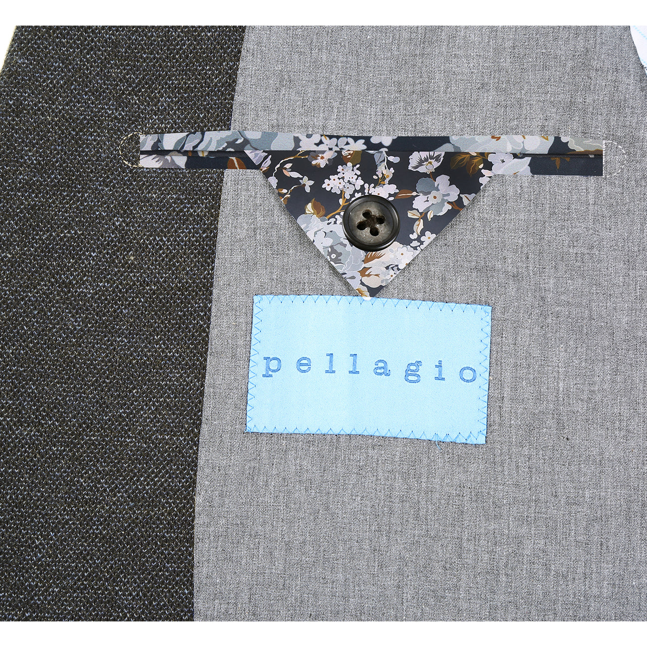The Pellagio Men's Slim Fit Riserva Jacket in charcoal (PF25-10) is styled with a white dress shirt, a striped orange and blue tie, and a patterned pocket square, all displayed on a mannequin.