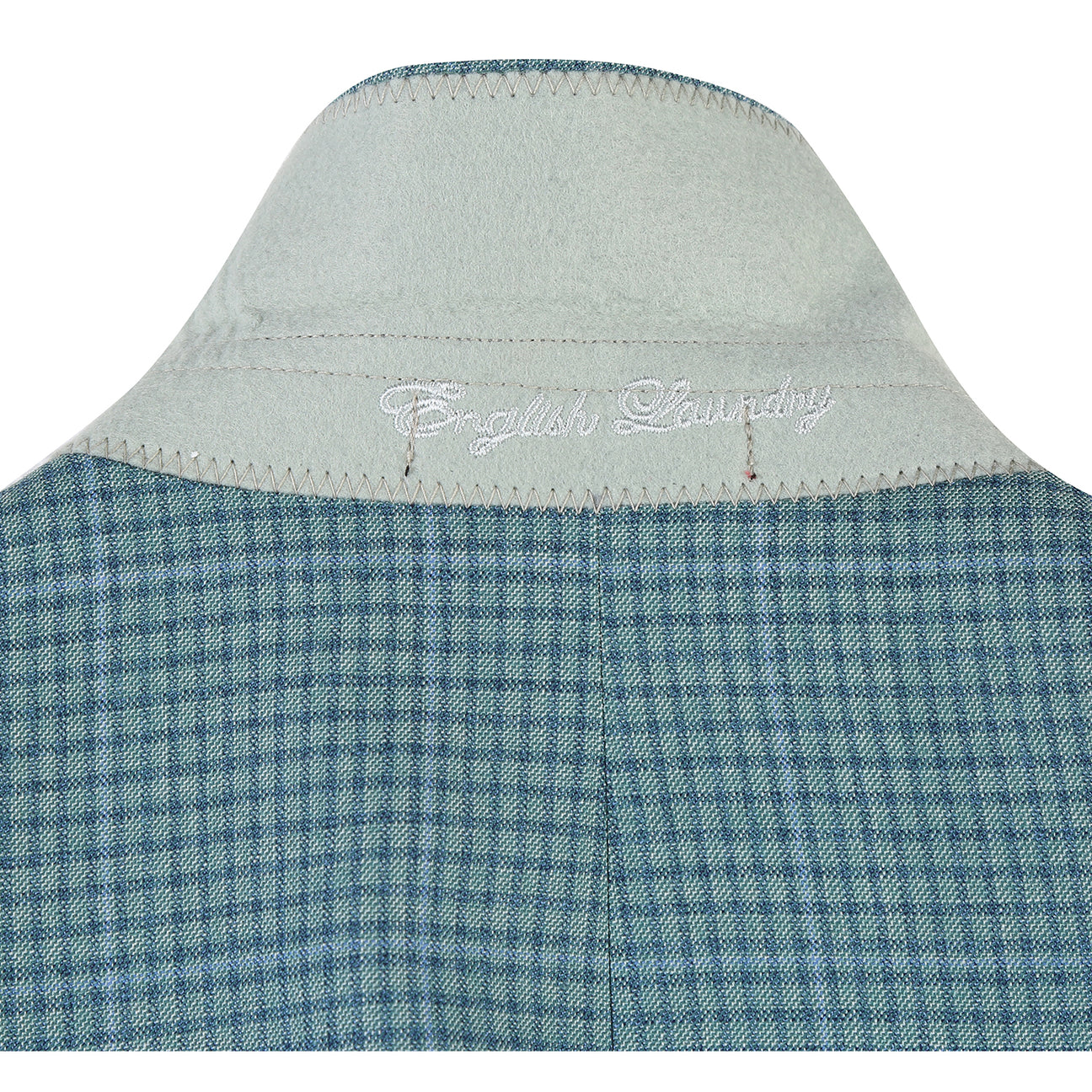 The ENGLISH LAUNDRY Grey Wool Suit EL92-53-341 by English Laundry features a slim fit wool jacket with notch lapels, styled on a mannequin with a white dress shirt and red patterned tie for a modern, tailored look.