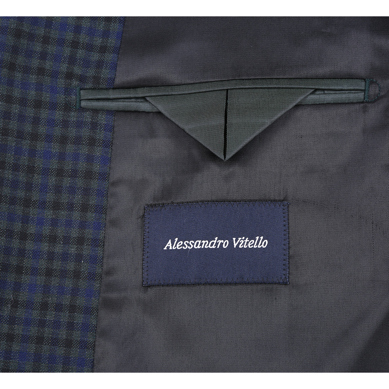 The Alessandro Vitello by Renoir New Slim Fit Wool Green Blazer 567-4 from Renoir features a modern silhouette, notch lapel, and two-button closure, styled here with a matching tie and white shirt.