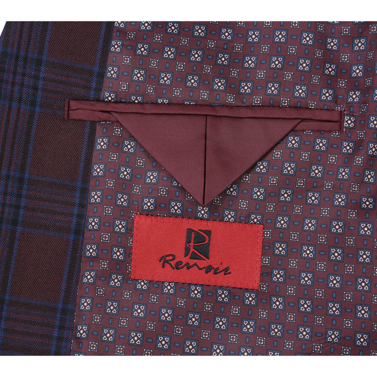 A mannequin displays an Alessandro Vitello by Renoir blazer in a burgundy slim fit, single-breasted style with side vents, paired elegantly with a white shirt and black polka dot tie.