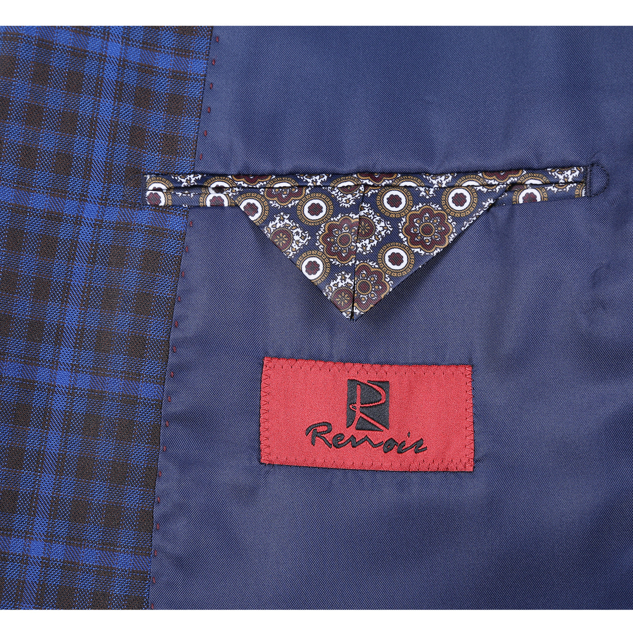 A mannequin is styled in the Renoir Alessandro Vitello New Slim Fit Blazer Blue 294-49, featuring a crisp white shirt, a striped tie, and a patterned pocket square. The sophisticated notch lapel adds an elegant touch.