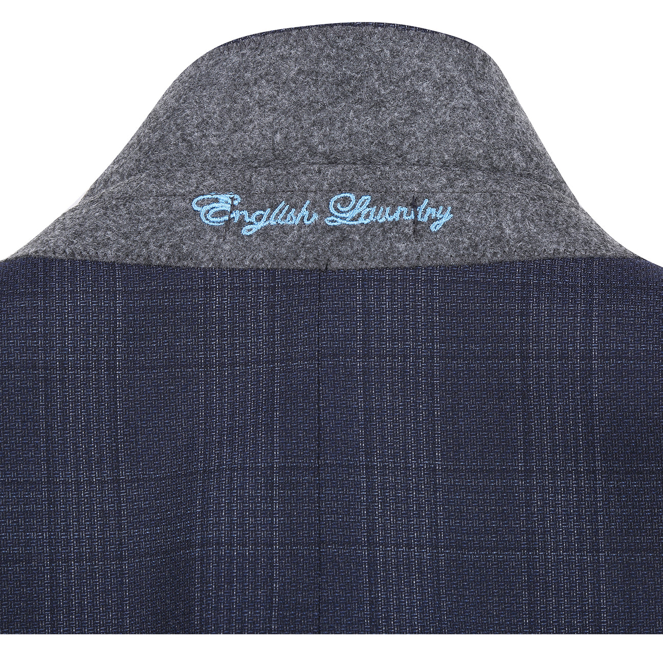 A man wears the English Laundry ENGLISH LAUNDRY 2pc Wool Suit Navy EL22-60-410; close-ups highlight its navy plaid fabric (90% wool, 10% polyester), inner lining, buttons, and embroidered label.