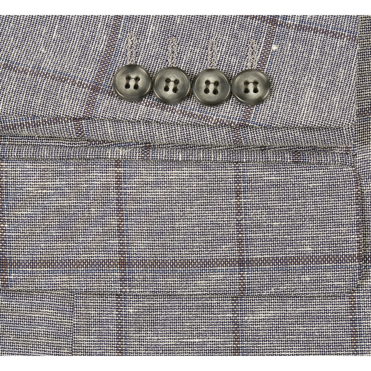 The Alessandro Vitello by Renoir Gray Blue blazer is styled on a mannequin with a white shirt, blue patterned silk tie, and matching pocket square.