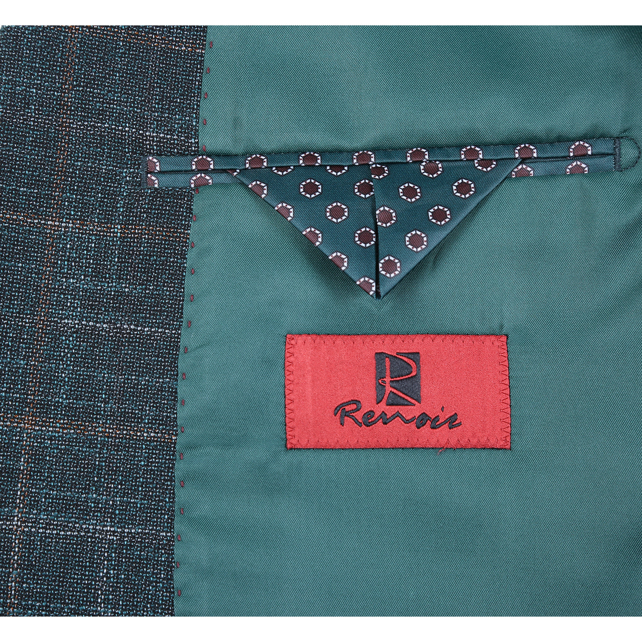 The Alessandro Vitello by Renoir New Slim Fit Blazer Green 294-48, a single-breasted jacket with peak lapels, is displayed on a mannequin. Paired with a white shirt and patterned beige tie and pocket square, this ensemble offers a sleek slim fit for the modern sophisticate.