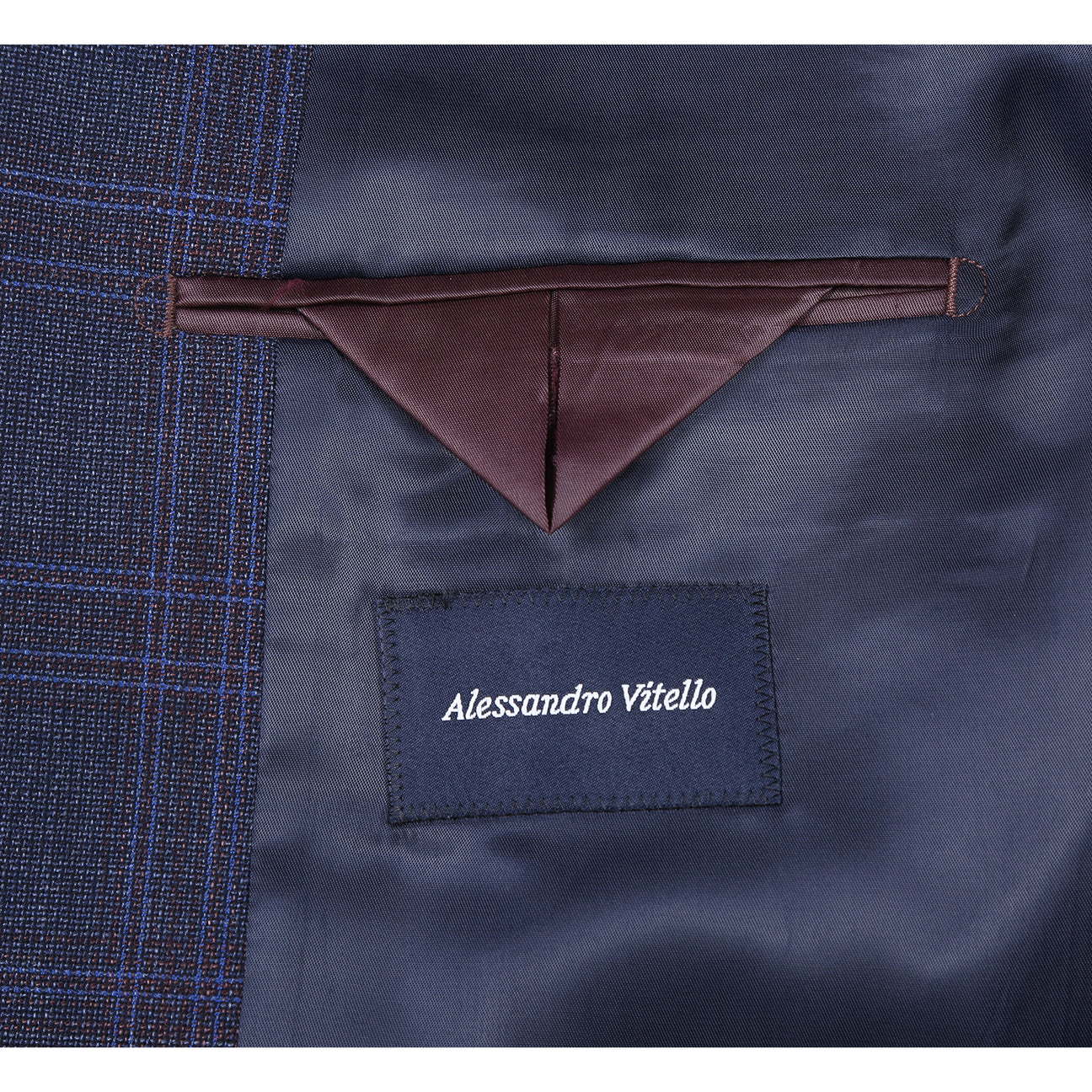 The Renoir Alessandro Vitello New Slim Fit Wool Brown Blazer 567-3 is expertly tailored from 100% wool; close-ups highlight its lapel and buttoned sleeve details. Paired with a striped tie and pocket square for added style.
