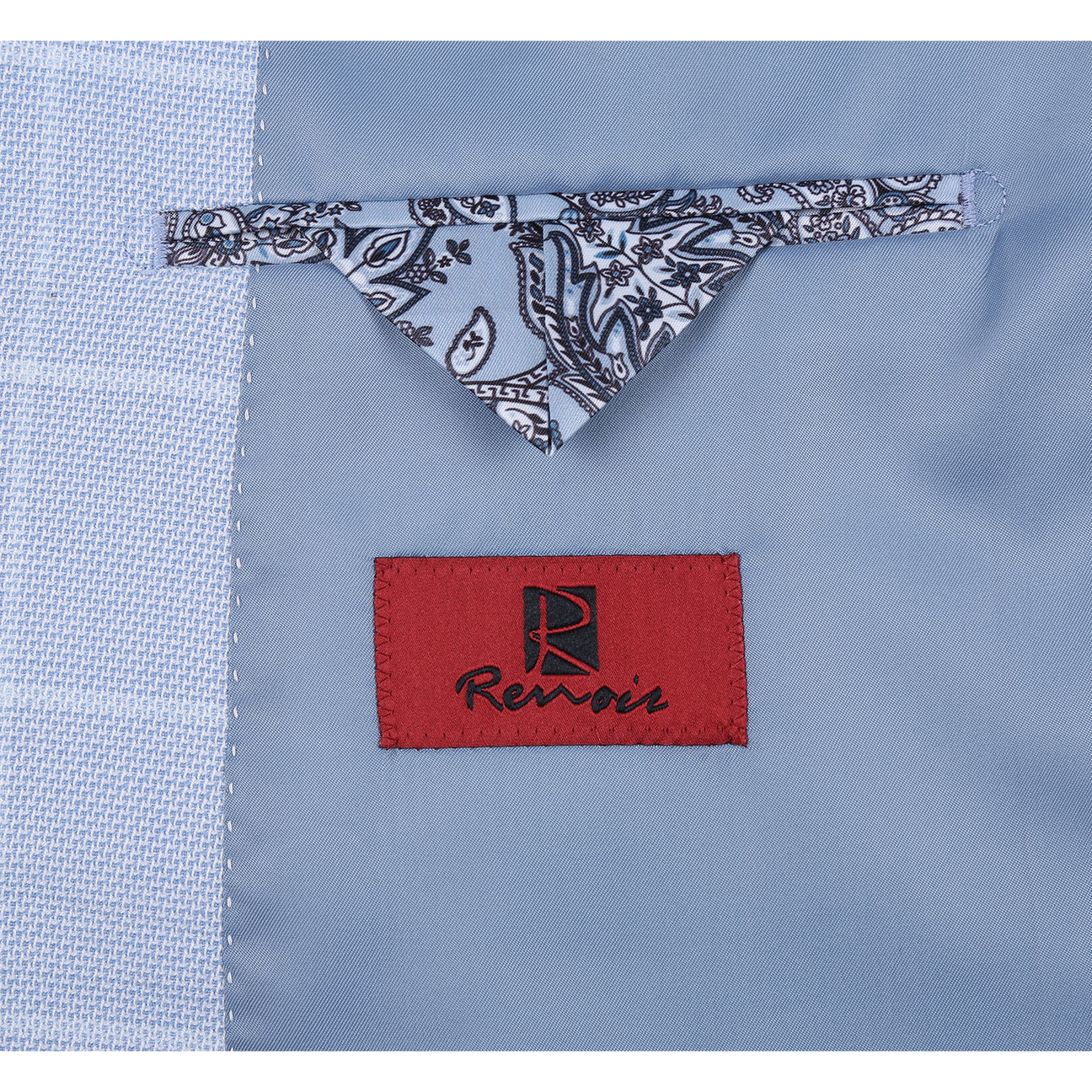 The Renoir Alessandro Vitello Classic Fit Light Blue Blazer 294-64 features notched lapels, a one-button closure, two front pockets, a chest pocket with patterned square, and is styled with a white shirt and blue striped tie.