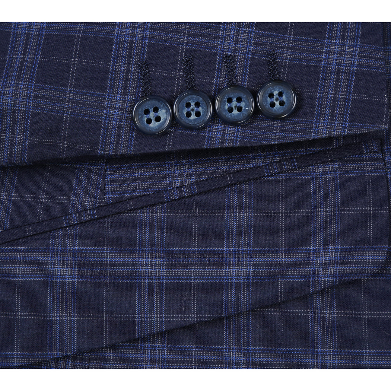 The Alessandro Vitello by Renoir slim fit suit jacket in navy, with a two-button closure, is showcased on a mannequin with a white shirt and maroon polka dot tie, made from a stylish blend of polyester, rayon, and spandex.