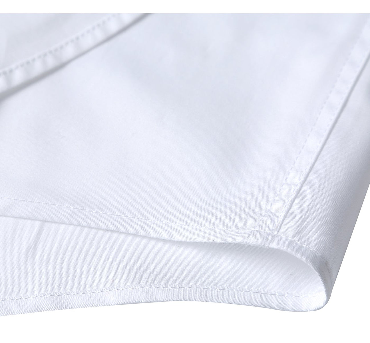 The Renoir VERNO White Classic Fit Long Sleeve Travel Easy-Care Cotton Dress Shirt (CS0220) is neatly folded, with a spread collar and buttoned cuffs, shown beside a circular fabric close-up highlighting its wrinkle resistance.