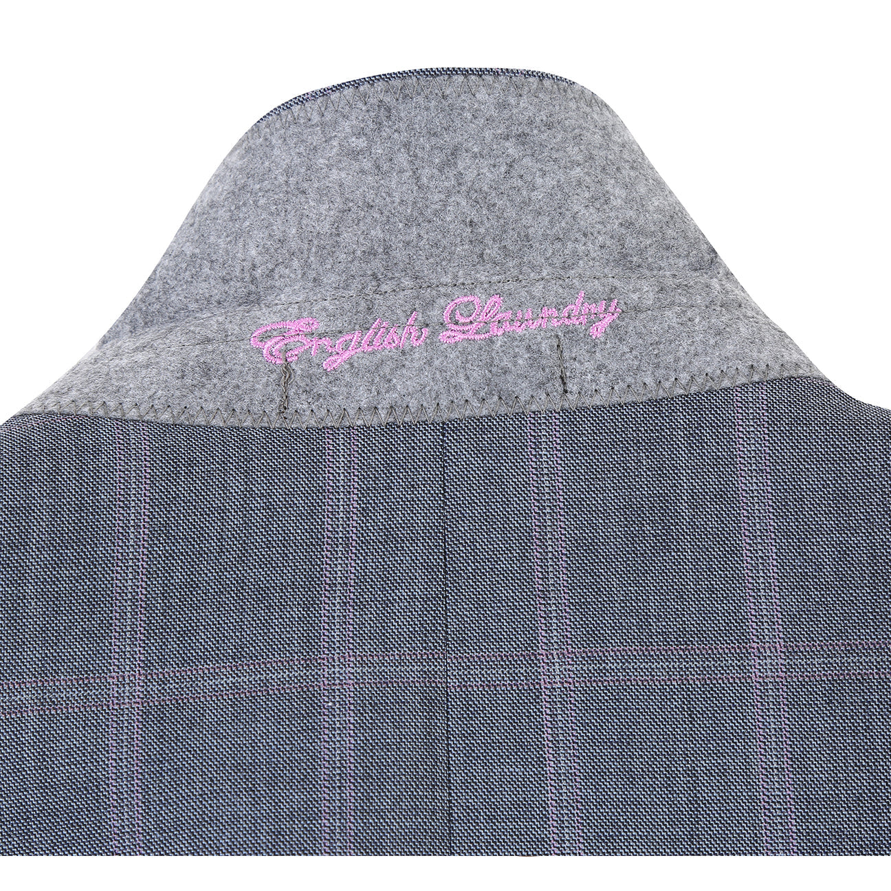 The ENGLISH LAUNDRY Grey Wool Suit EL92-52-093 by English Laundry is shown on a headless mannequin, featuring a gray plaid wool jacket with two-button closure over a white dress shirt and blue patterned tie.