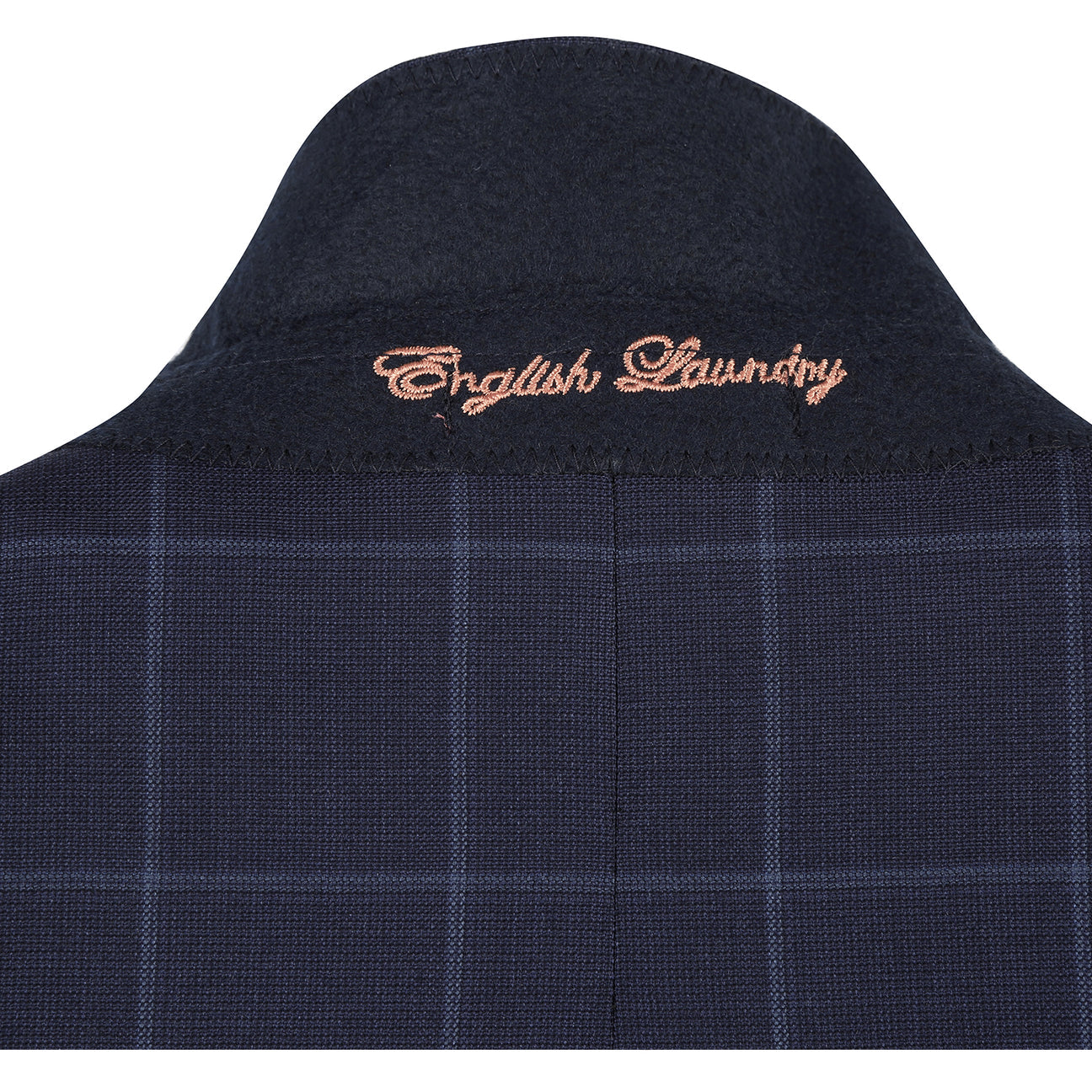 The ENGLISH LAUNDRY Blue Wool Suit EL92-52-410 by English Laundry, featuring notch lapels and a sharp slim fit, is styled on a mannequin with a white shirt and burgundy dotted tie.