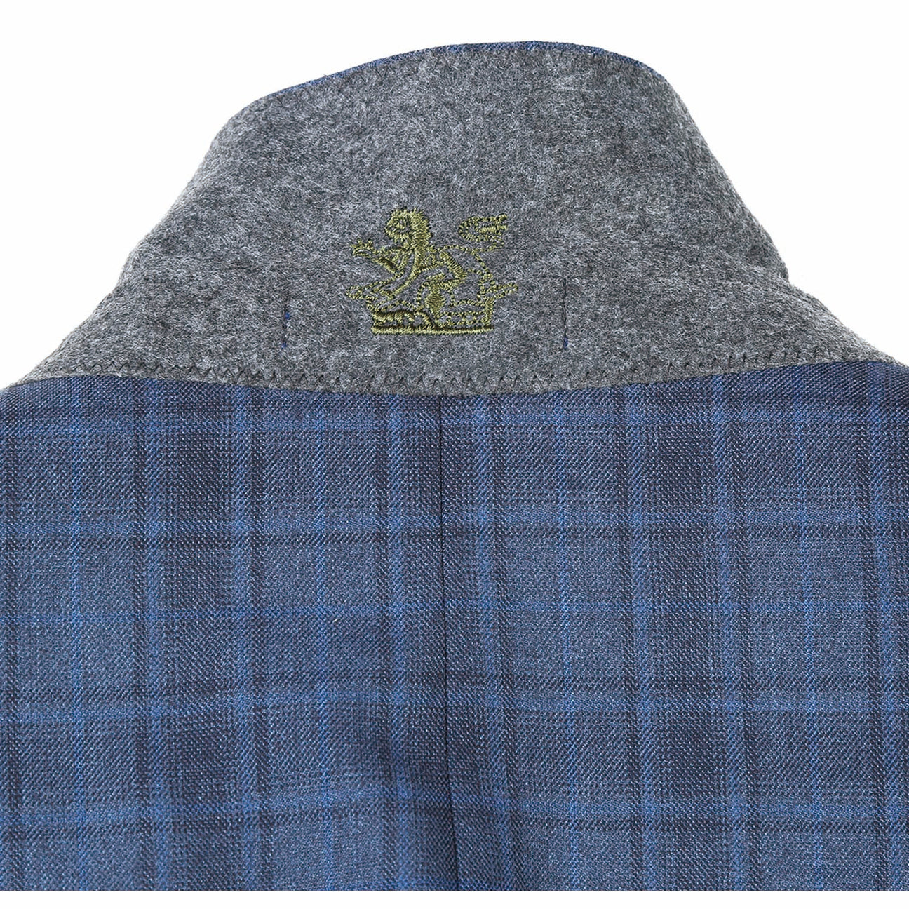 The mannequin is adorned with the ENGLISH LAUNDRY Cadet Blue Check Suit 92-53-095EL, a stylish offering from English Laundry, complemented by an immaculate white shirt and a striped tie. Its elegant peak lapels bring an air of sophistication to the ensemble.