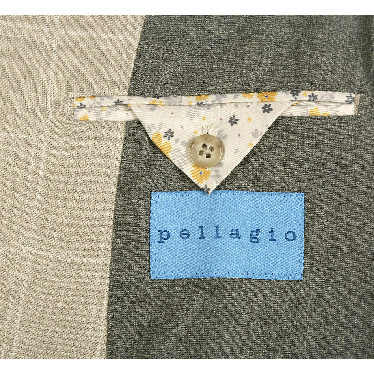 The Pellagio Beige Men's Slim Fit Riserva Jacket PS26-7 features a light check pattern, two buttons, front pockets, and a pocket square. Displayed on a mannequin with a white shirt and striped tie. Brand: Pellagio.