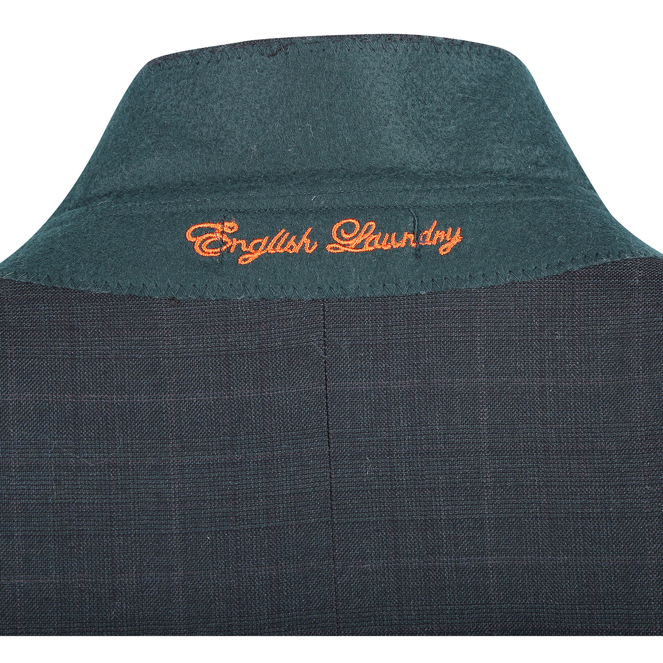 The ENGLISH LAUNDRY 2pc Wool Suit Olive EL22-58-341 by English Laundry features a slim fit jacket in olive wool with two buttons, subtle patterning, and a distinctive inner lining with colorful floral designs.