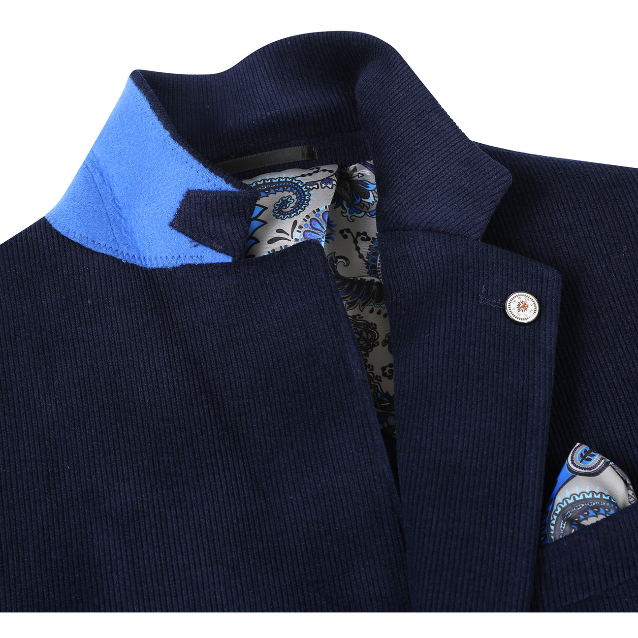 The Pellagio Navy Blue Men's Half Canvas Blazer (PF24-9), featuring a slim fit, single-breasted design, two buttons, and notched lapel, is paired with a crisp white shirt and red polka dot tie. It includes two front pockets and a stylish patterned pocket square.