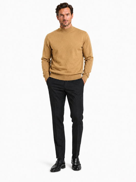 The Bassiri L/S Mock-Neck Gold Sweater 630 by Bassiri is a stylish gold sweater made from plush cotton, showcased against a plain white background.