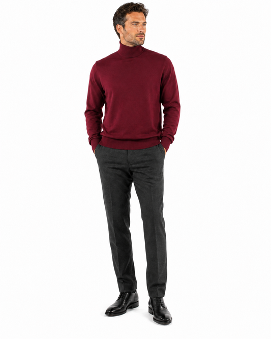 A burgundy turtleneck sweater made from cotton, displayed on a mannequin for a front view showcase. Style #631 by Bassiri.
