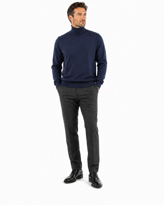 The Bassiri L/S Turtleneck Navy Sweater 631, made by Bassiri in sumptuous cotton, is showcased against a plain white background.