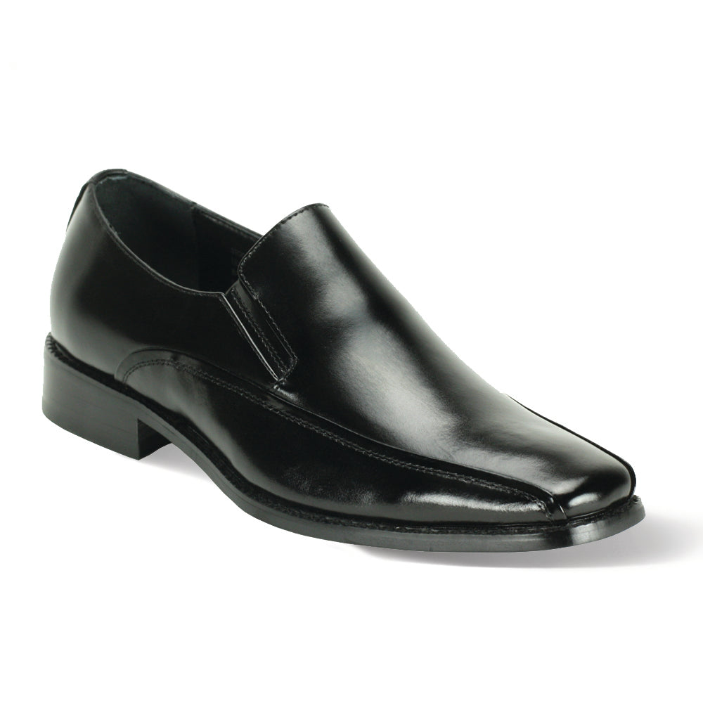 Against a white background, the Giorgio Venturi 6346 Black Leather Shoes are showcased. These slip-on loafers feature a glossy finish, low heel, and sleek bike toe design.