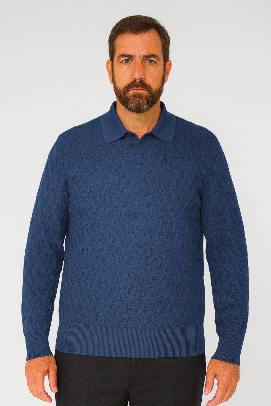 A bearded man stands facing forward against a white background, wearing the Bassiri Long Sleeve Collar Neck Navy Sweater 639 and black pants, with a neutral expression.