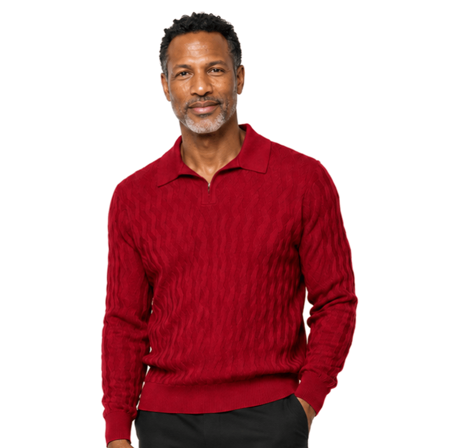 A bearded man stands facing forward in a Bassiri Long Sleeve Collar Neck Red Sweater 639 and dark pants against a plain light background.