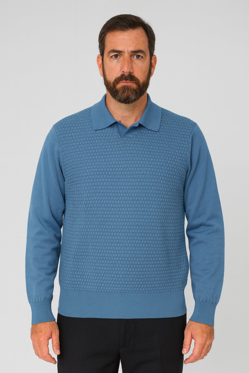 A man with a beard and mustache wears the Bassiri Long Sleeve Collar Neck Denim Sweater 640 and black pants, standing against a plain light background.