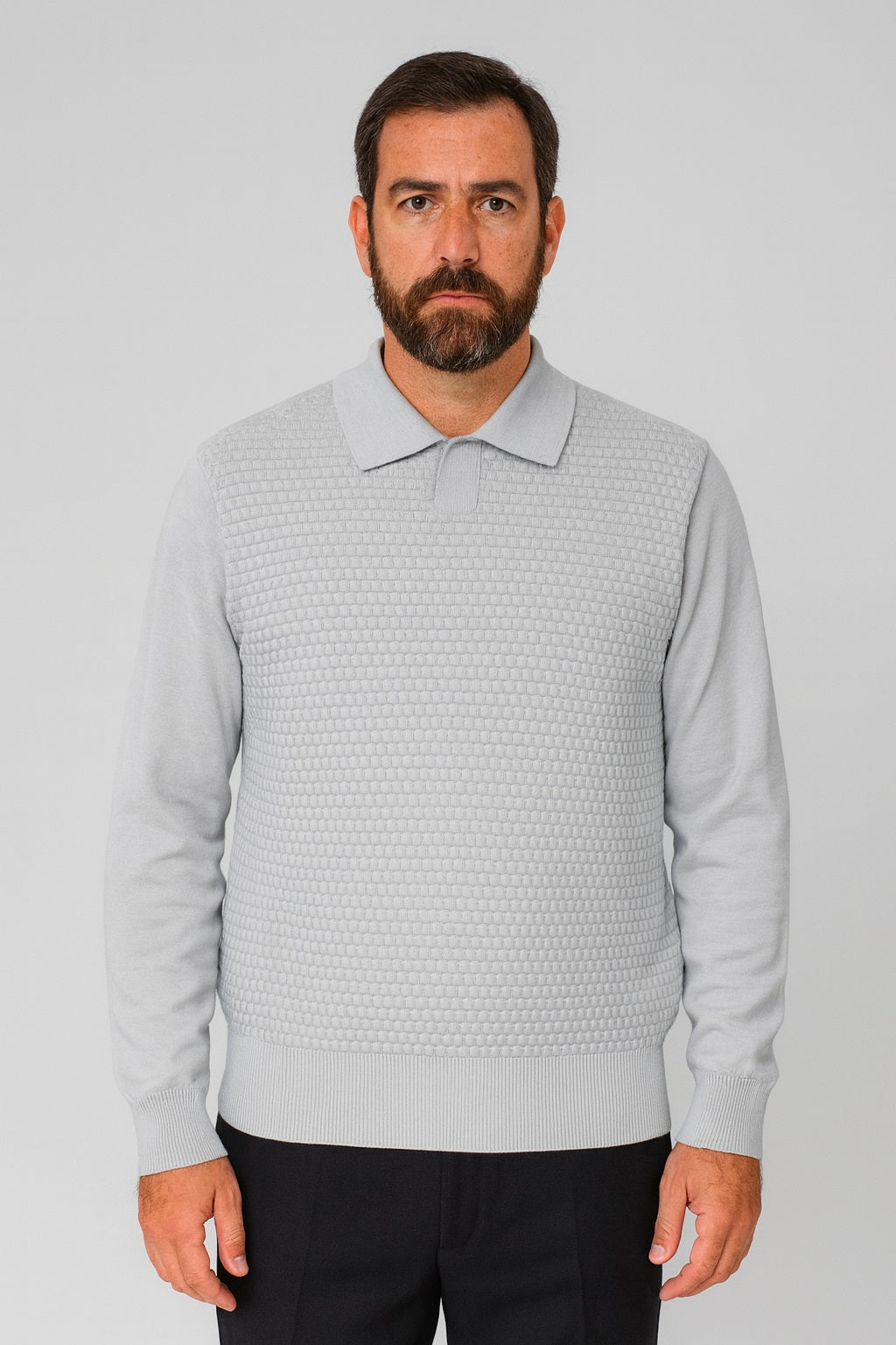 A man with a beard wears the Bassiri Long Sleeve Collar Neck Grey Sweater 640 and black pants, standing facing forward against a plain light background.
