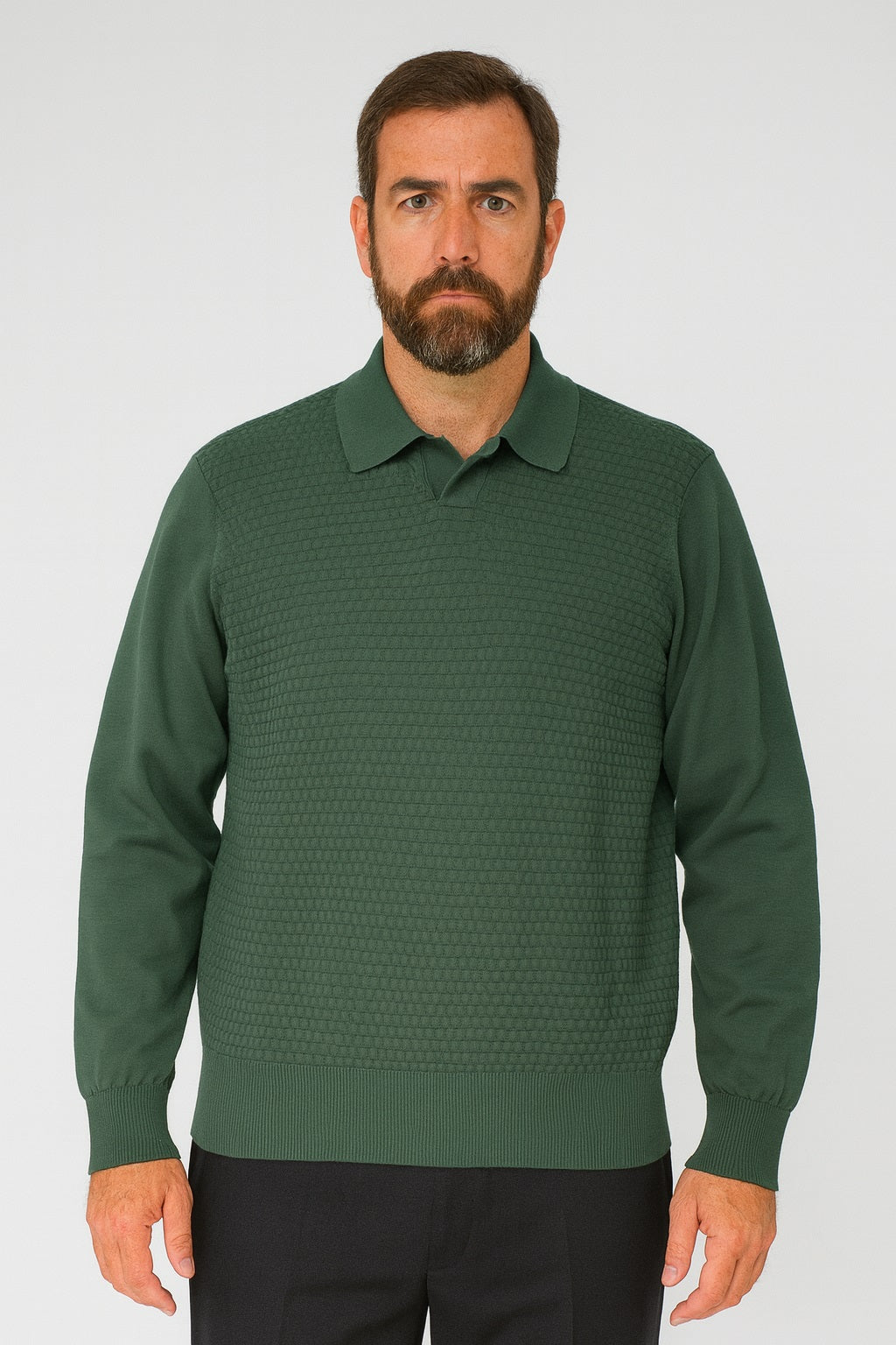 A bearded man faces forward against a white background, wearing the Bassiri Long Sleeve Collar Neck Olive Sweater 640 and dark pants.