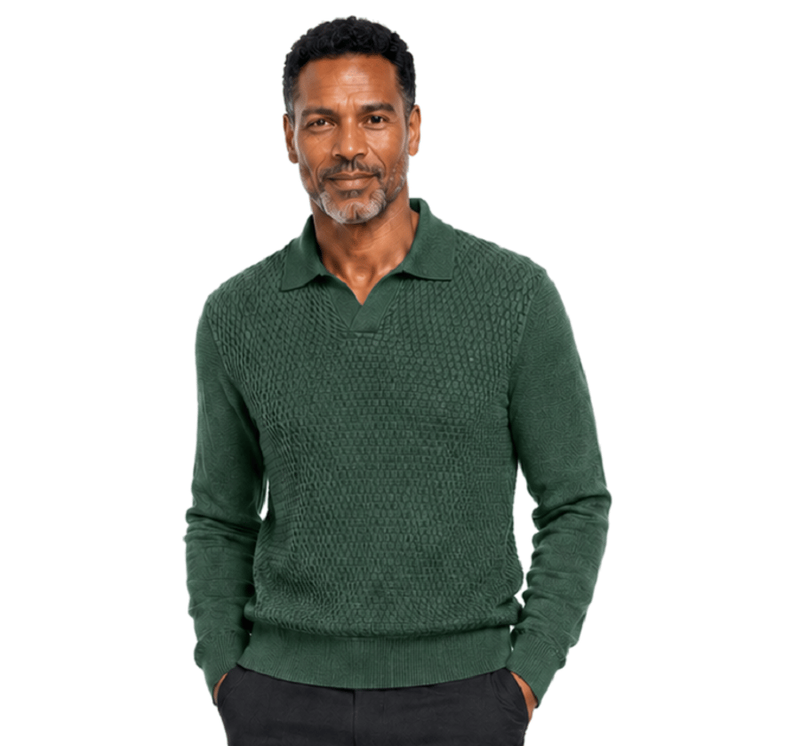 A bearded man faces forward against a white background, wearing the Bassiri Long Sleeve Collar Neck Olive Sweater 640 and dark pants.