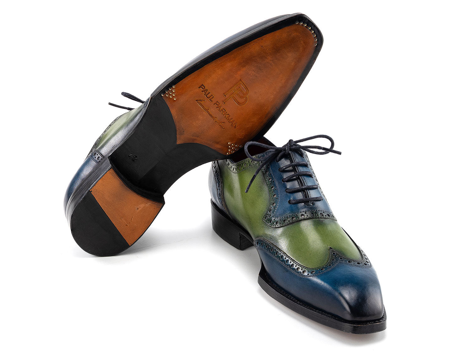 The Paul Parkman Goodyear Welted Men's Wingtip Oxfords (6819-BRN) feature blue and green hand-painted leather, brogue details, and black laces, shown on a white background.