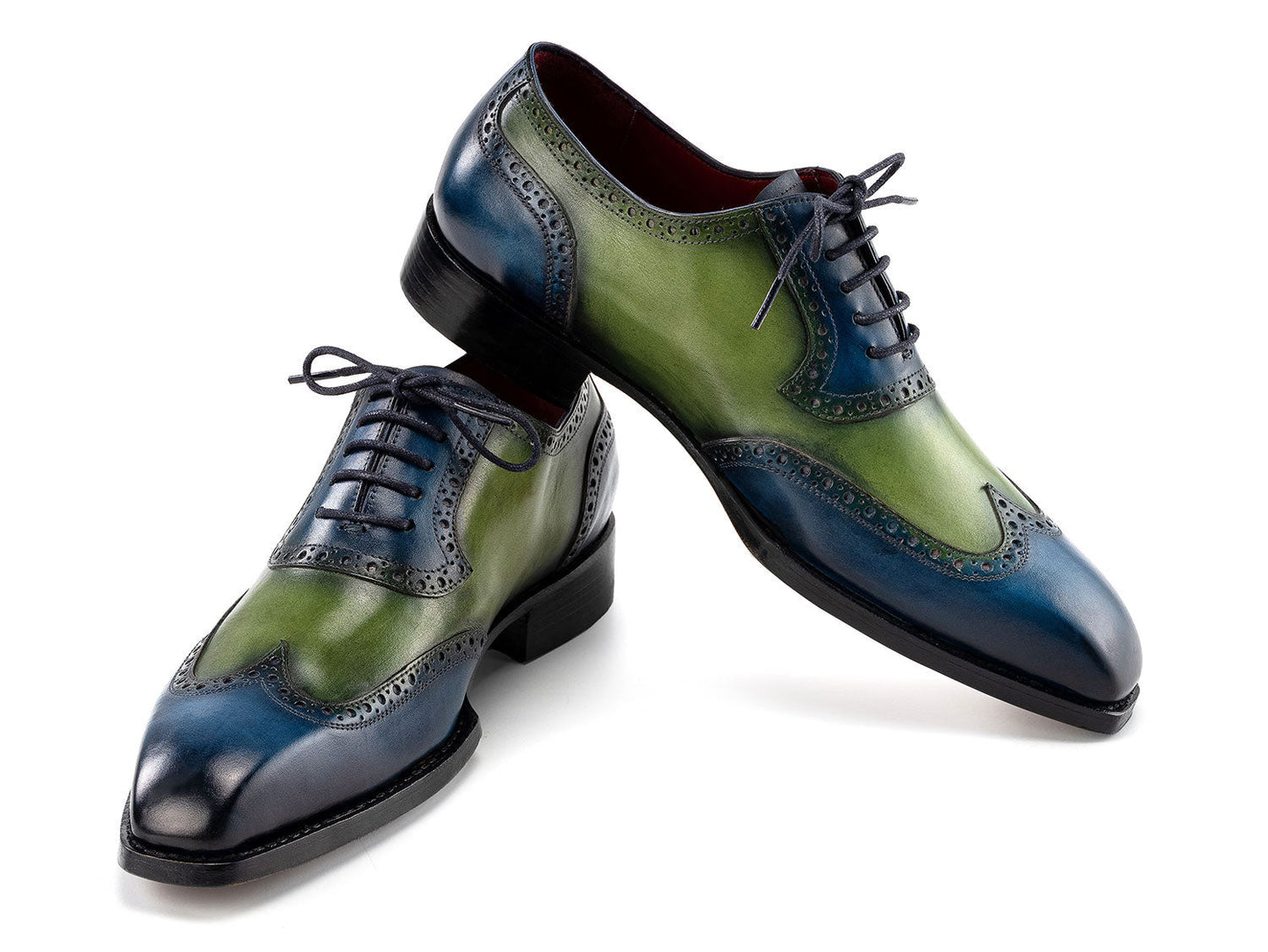 The Paul Parkman Goodyear Welted Men's Wingtip Oxfords (6819-BRN) feature blue and green hand-painted leather, brogue details, and black laces, shown on a white background.