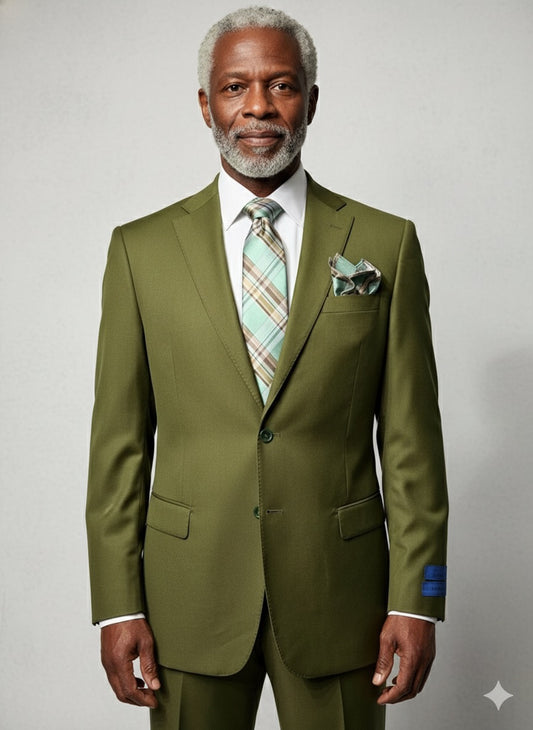 The Cavellini Uomo Dolcetto MODERN FIT Suit 6667/112 by CAVELLI is displayed on a mannequin with matching trousers, a plaid tie, and pocket square in a wood-paneled room.