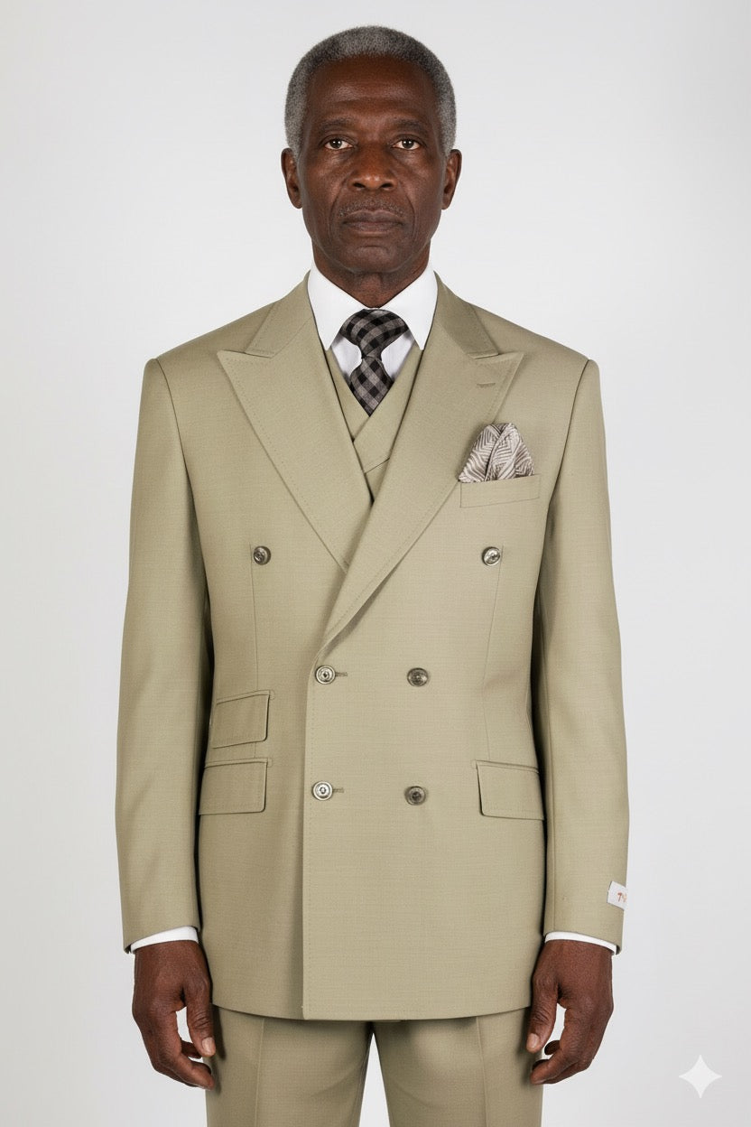 Displayed on a mannequin is the Tiglio Rosso DB Este Solid Tan Tig1004 suit, paired with a matching waistcoat, white shirt, plaid tie, and patterned pocket square. This elegant three-piece suit embodies style with its wide leg fit.