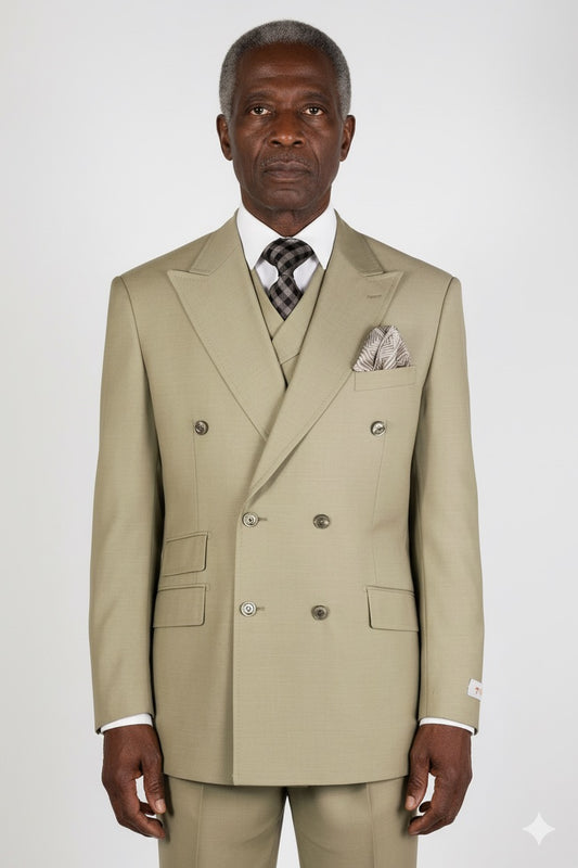 Displayed on a mannequin is the Tiglio Rosso DB Este Solid Tan Tig1004 suit, paired with a matching waistcoat, white shirt, plaid tie, and patterned pocket square. This elegant three-piece suit embodies style with its wide leg fit.