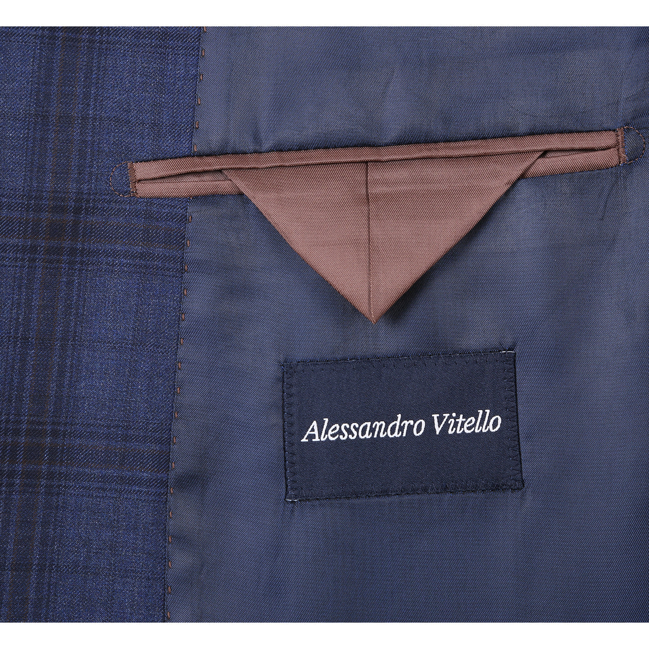 The Renoir Alessandro Vitello New Slim Fit Wool Navy Suit 566-14 is displayed on a mannequin, paired with a white dress shirt and dark patterned tie.