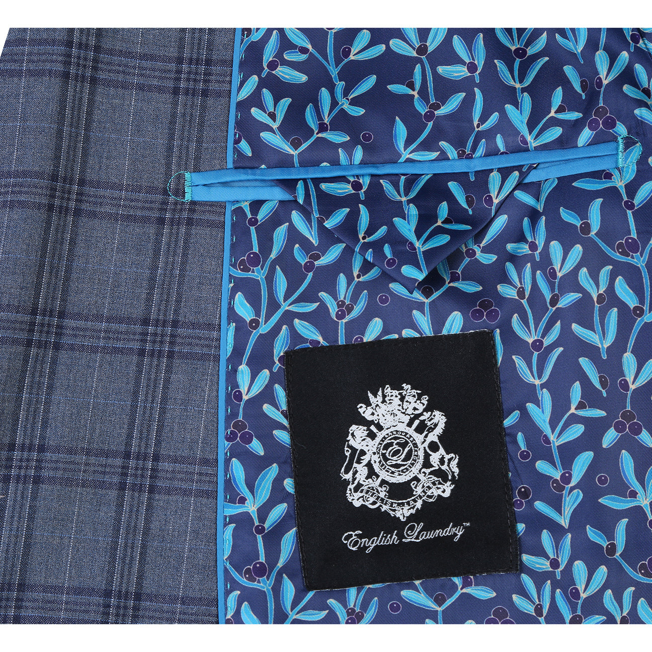 The ENGLISH LAUNDRY Wool Suit EL92-57-093 by English Laundry features a gray plaid slim-fit jacket over a white dress shirt with a red patterned tie, displayed on a mannequin.