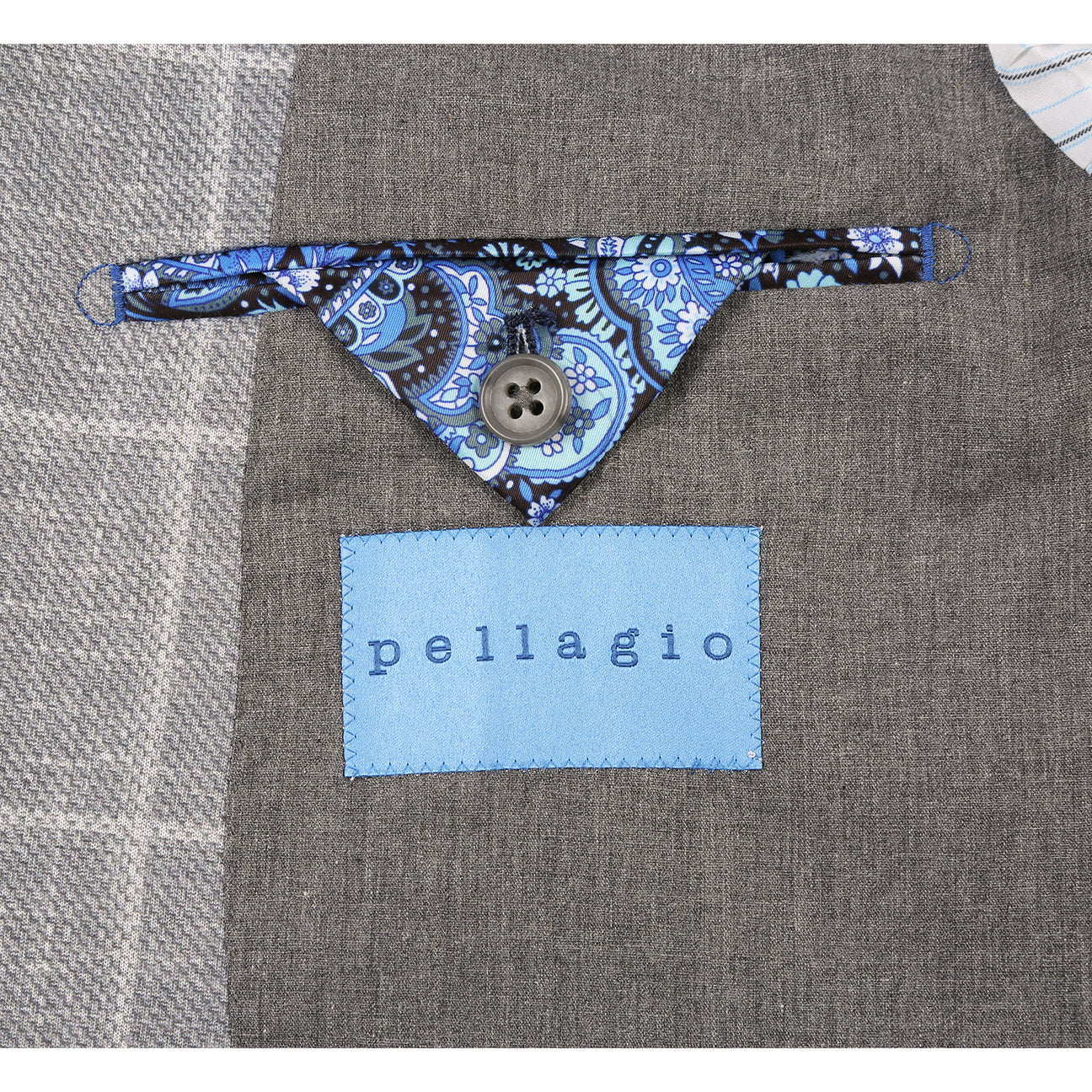 The Pellagio Men's Half Canvas Blazer Gray PS25-4 features a slim fit with a gray plaid pattern, displayed on a mannequin styled with a white shirt, red patterned tie, and blue pocket square.