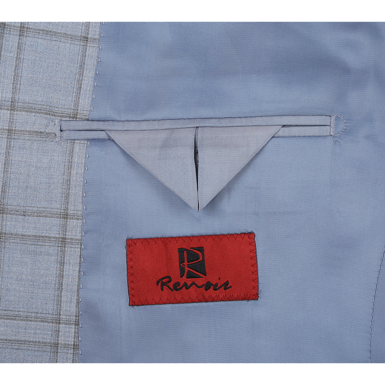 The Renoir Alessandro Vitello Blue 293-40 slim fit suit jacket, paired with a white shirt and red patterned tie, is elegantly displayed on a mannequin.