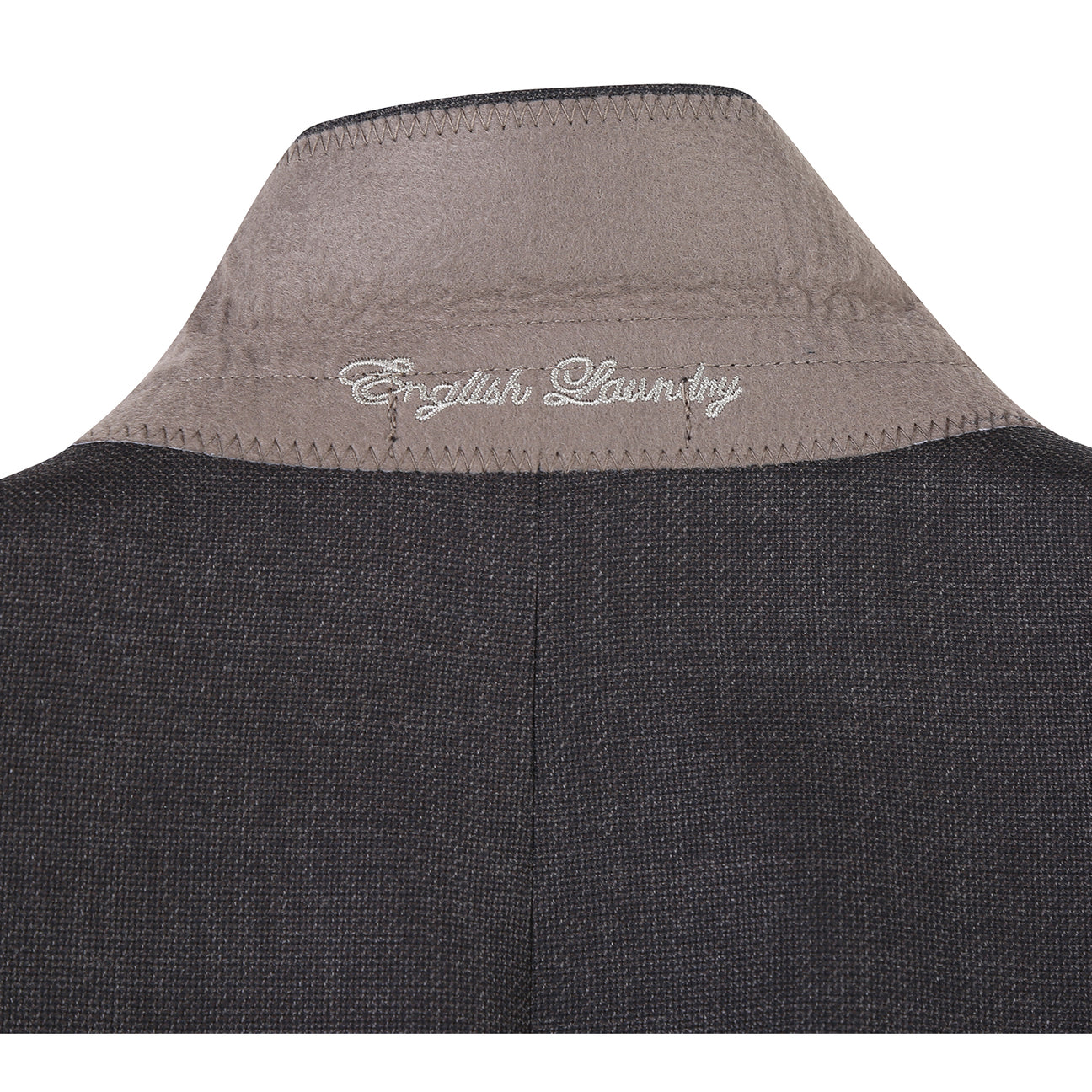 The ENGLISH LAUNDRY Dark Gray Suit EL12-02-095 by English Laundry, styled on a mannequin with a white dress shirt and black, gray, and silver striped tie, offers a refined slim fit suit look.