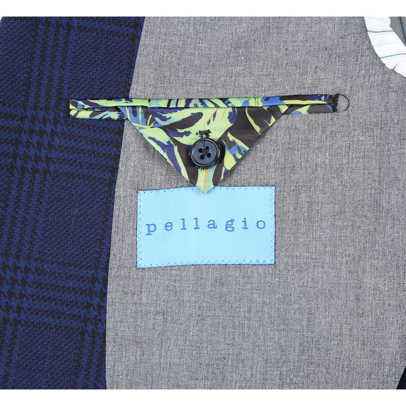 Mannequin styled in Pellagio Royal Blue Men's Half Canvas Blazer PF24-10 with a white shirt, red polka dot tie, and green pocket square.