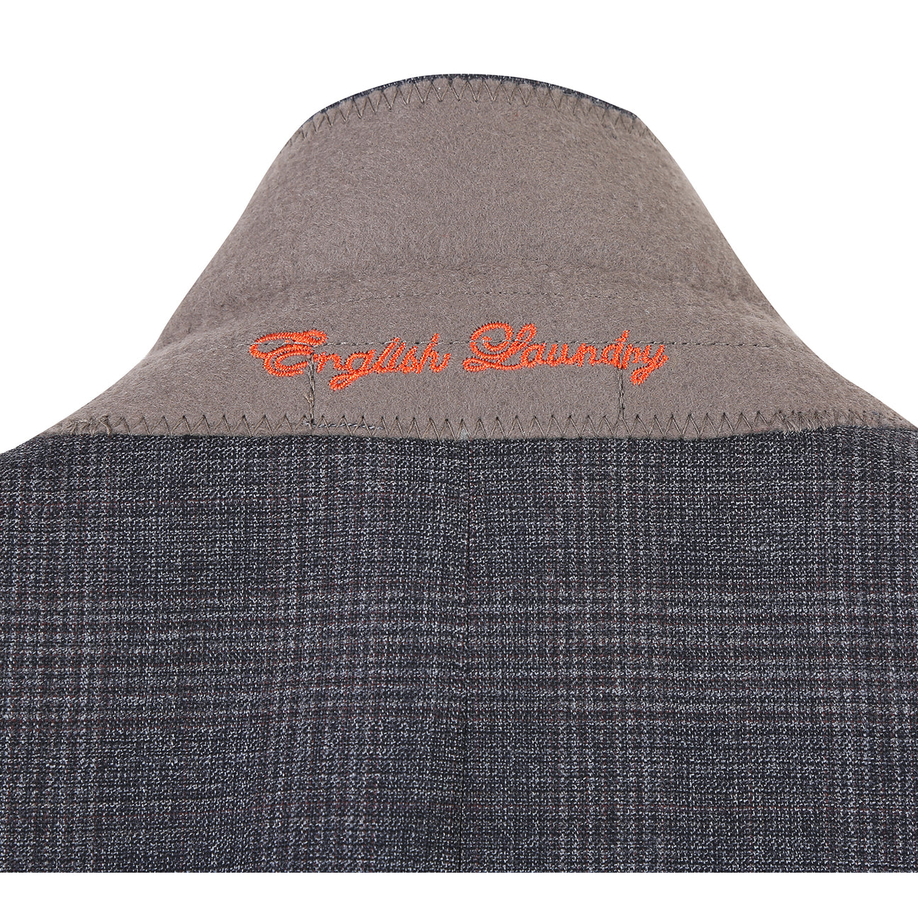 The ENGLISH LAUNDRY Dark Gray Check Suit EL12-57-095 by English Laundry is displayed on a mannequin, styled with a white dress shirt and a red patterned tie.