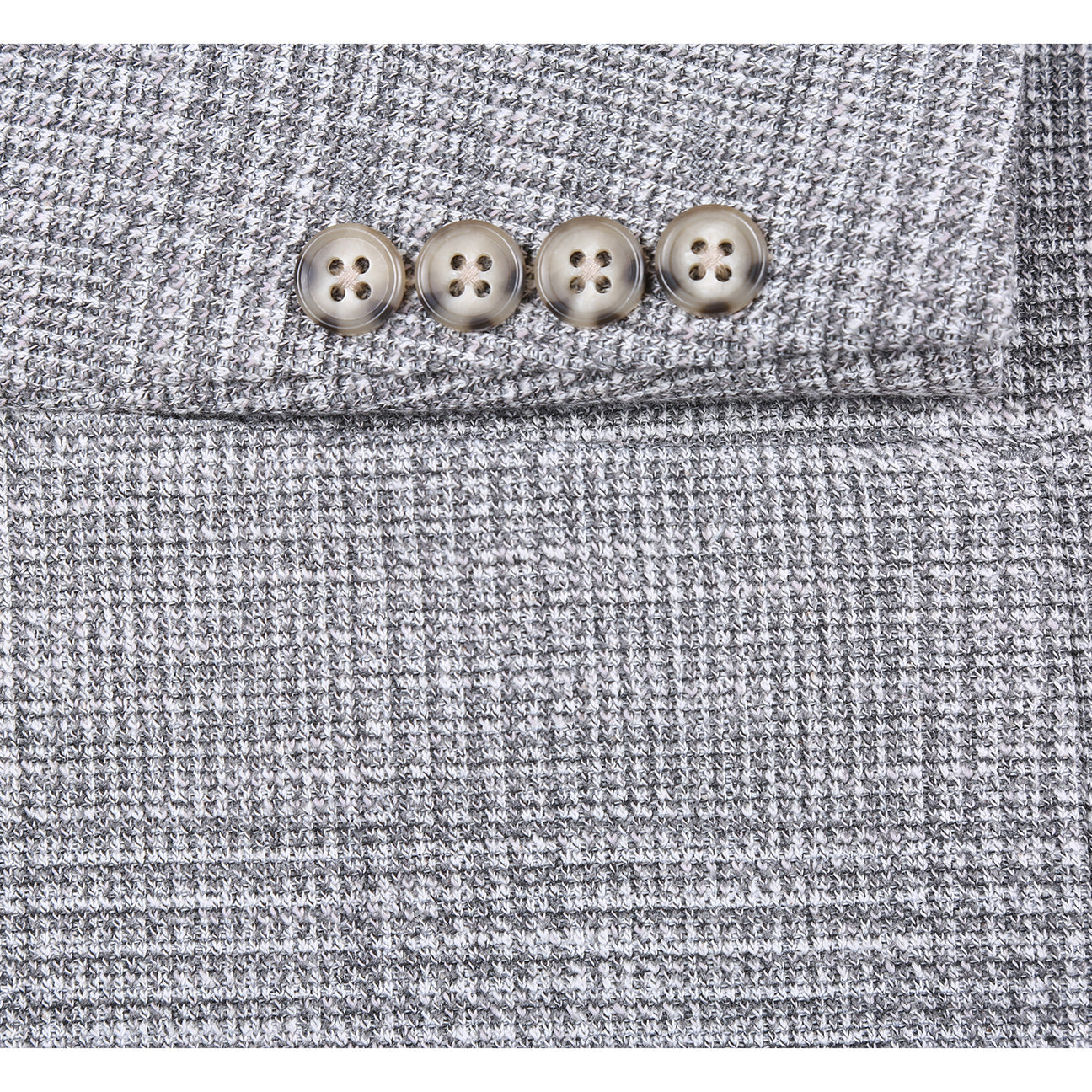 The Pellagio Light Gray Men's Slim Fit Riserva Jacket PS26-11 is styled on a mannequin with a white shirt, black tie, and black pocket square for a sleek look.