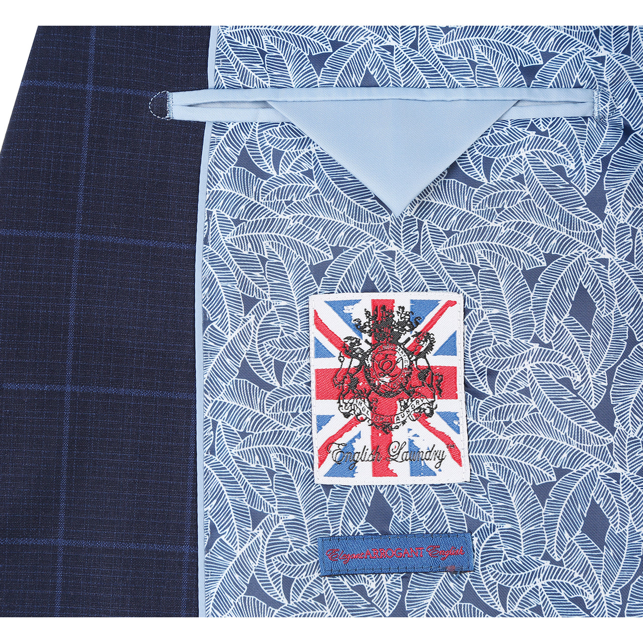 The ENGLISH LAUNDRY Midnight Blue Check Suit 12-55-410EL by English Laundry, featuring a slim fit jacket with notch lapels, is paired with a white dress shirt and red patterned tie on display.