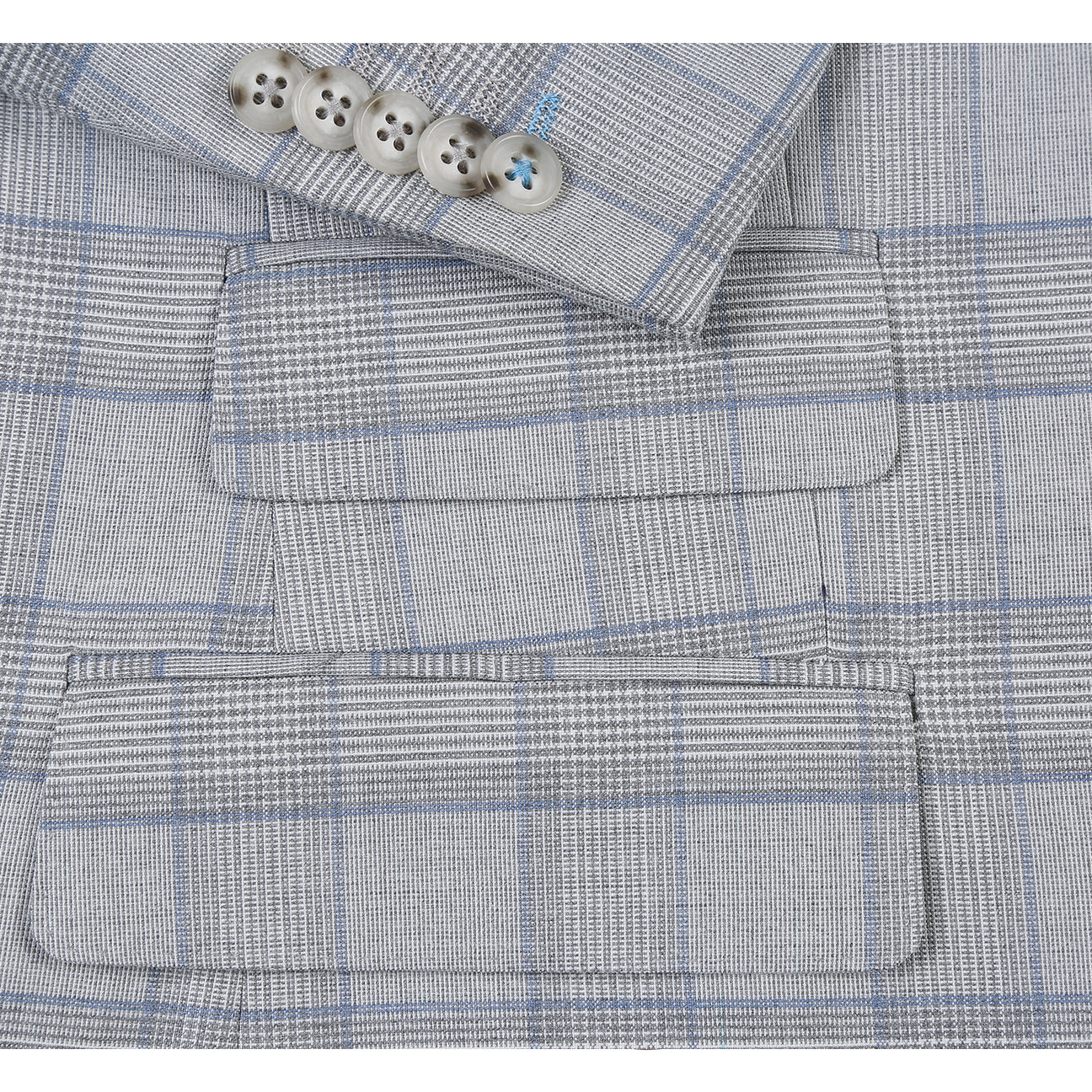 The English Laundry ENGLISH LAUNDRY TR Suit 12-66-092EL slim fit light gray plaid jacket, with a two-button closure, is displayed on a mannequin, paired with a white dress shirt and dark gray tie.