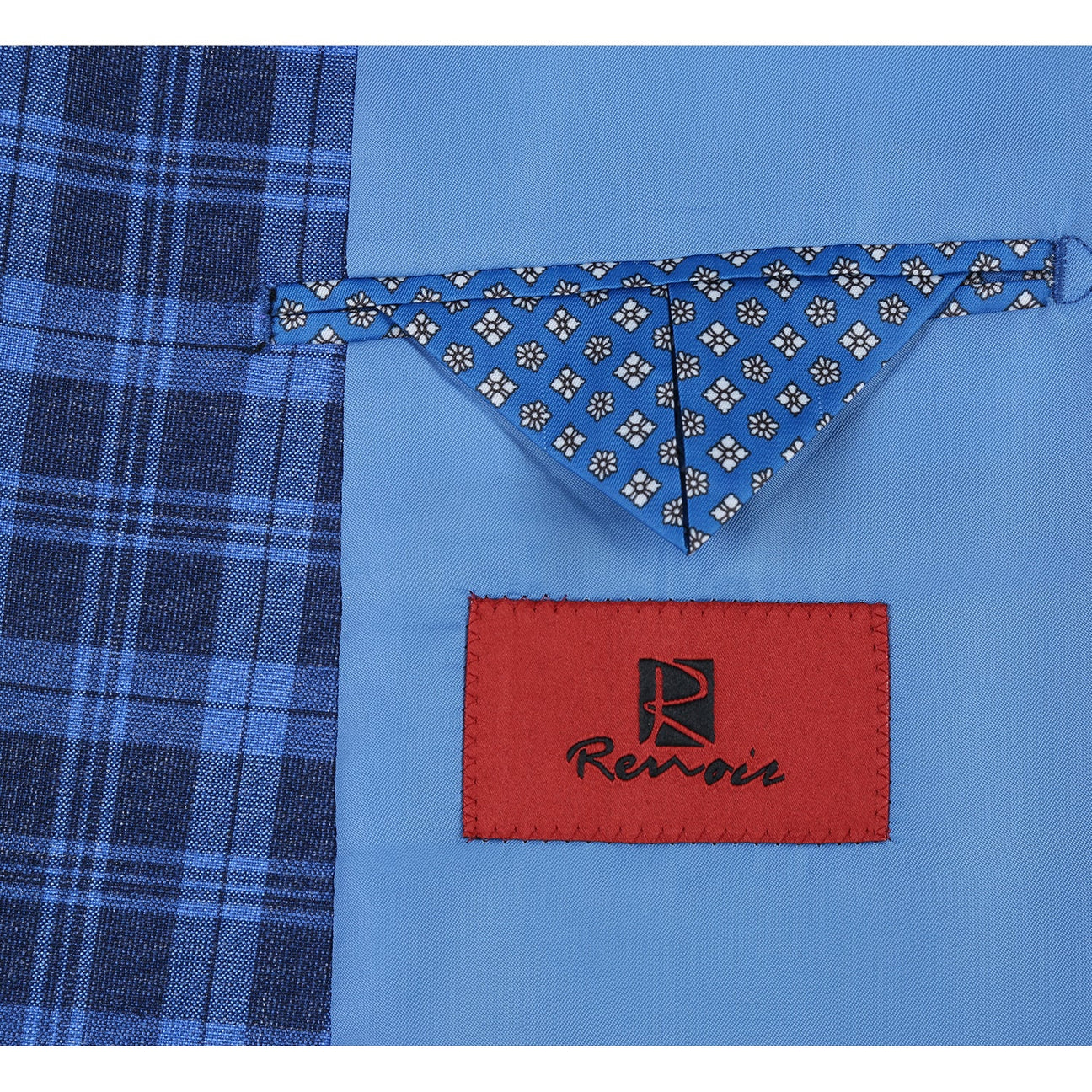 The Renoir Alessandro Vitello Slim Fit Blazer in royal blue (294-17) features classic notch lapels, a single button closure, and is styled with a white shirt and dark red polka dot tie on a mannequin for a refined look.