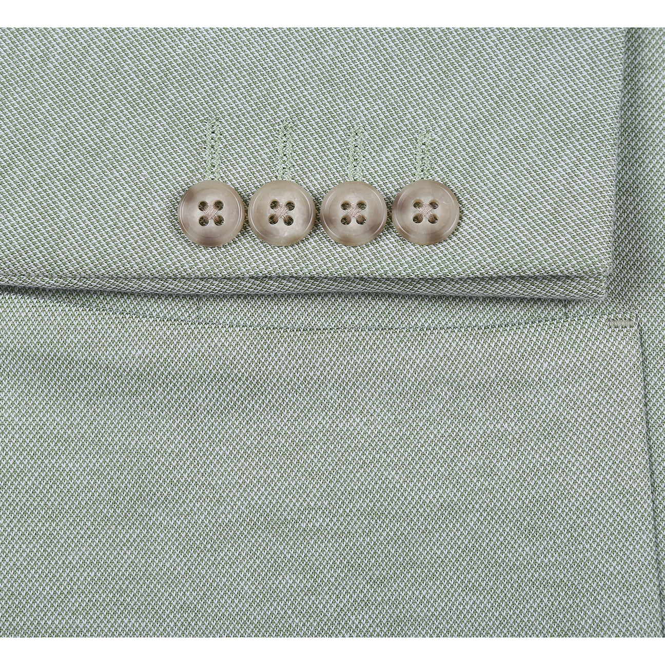 The Pellagio Light Green Men's Slim Fit Riserva Jacket PS26-3, styled on a mannequin with a white shirt, striped tie, and green pocket square, offers a sharp and modern look from the Pellagio brand.