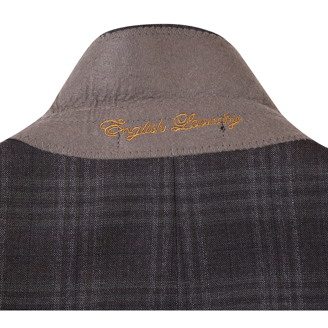 A mannequin showcases the English Laundry ENGLISH LAUNDRY Brown Check Suit EL12-58-555 with notch lapels, paired with a white dress shirt and a blue, brown, and gray striped tie.