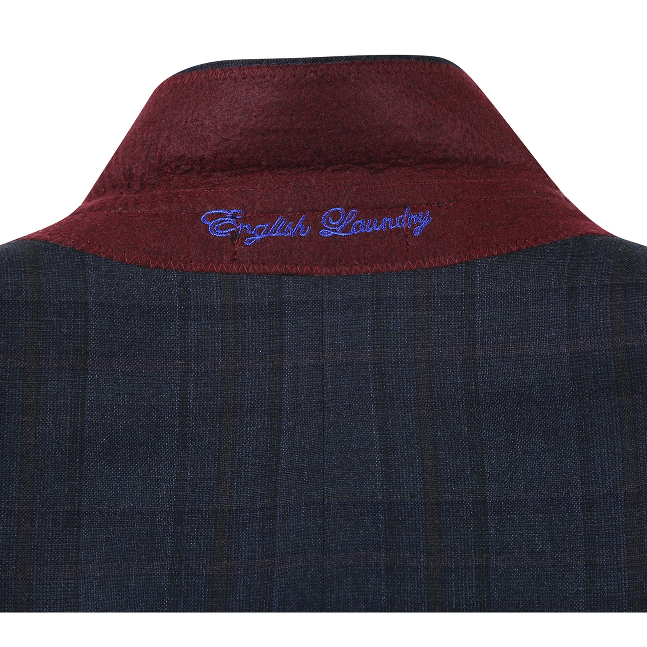 The ENGLISH LAUNDRY Dark Navy Check Suit EL12-56-475 by English Laundry is displayed on a mannequin with notched lapels, a white shirt, and striped tie—a sharp, modern two-button suit perfect for any occasion.